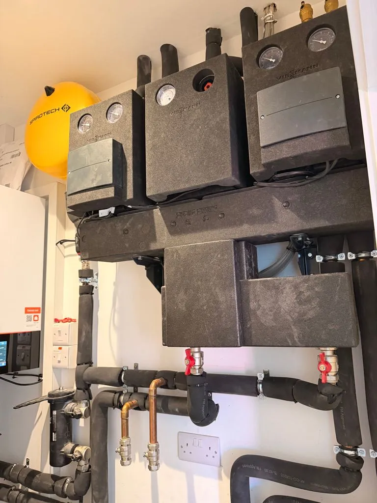 Viessmann heating manifolds and insulated pipework in a plant room